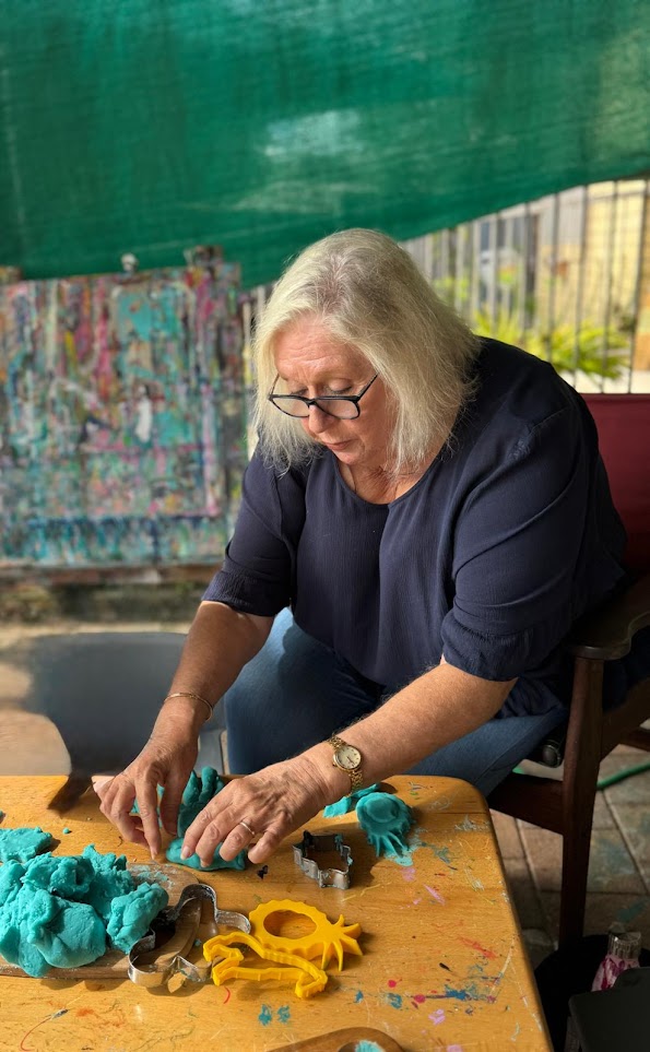 Playdough and cookie cutters with a Grand Friend