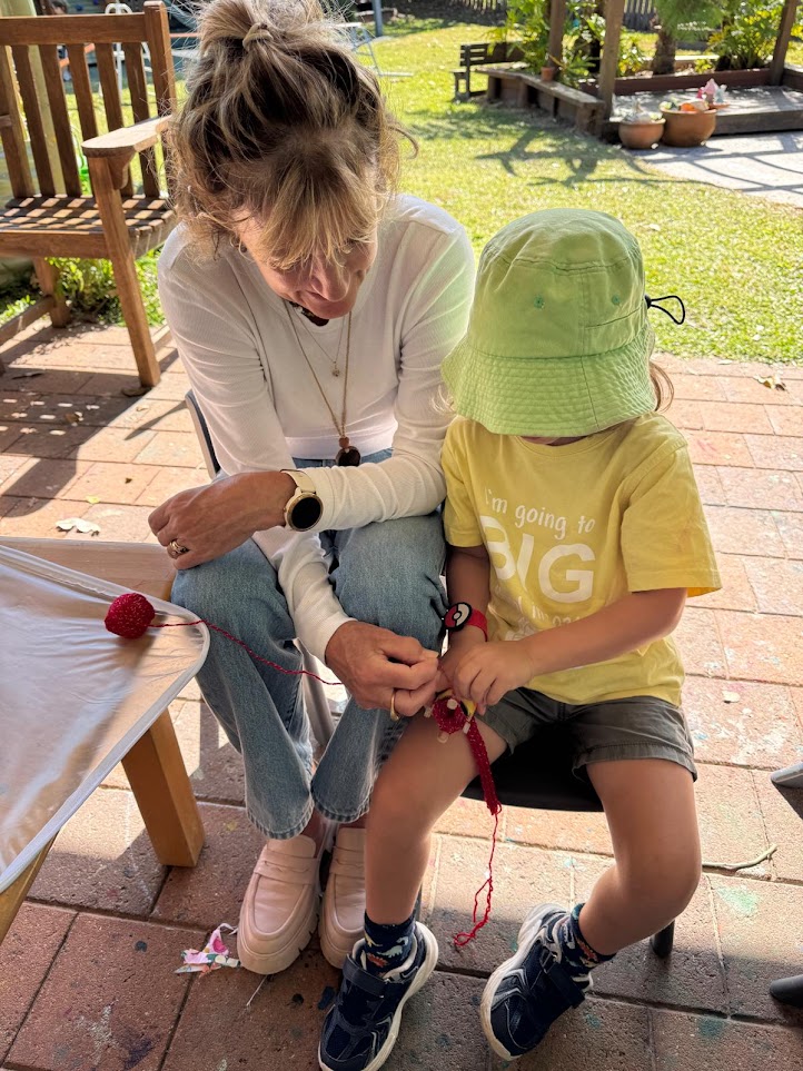 Making a friendship bracelet with a Grand Friend