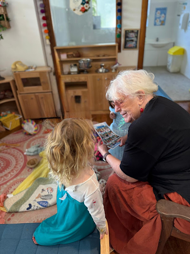 A Grand Friend reading with a child